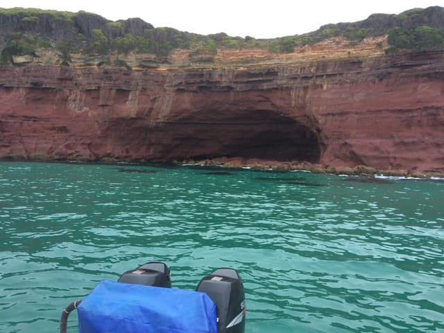 Red cliffs and turquoise water