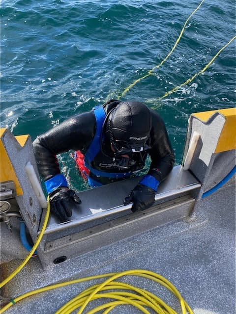 Diver entering water